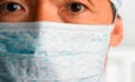 Doctor wearing mask Put Canadian doctor shortages to rest once and for all