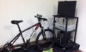 MedBIKE system stationary bike linked with tablet and video game Fitness program encourages kids with heart disease to train safely at home
